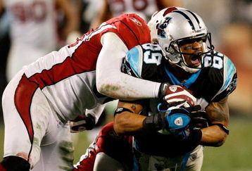 CHARLOTTE, NC - JANUARY 10:  Steve Smith #89 of the Carolina Panthers fights for a first down against the Arizona Cardinals during the NFC Divisional Playoff Game on January 10, 2009 at Bank of America Stadium in Charlotte, North Carolina.  (Photo by Kevin C. Cox/Getty Images)
