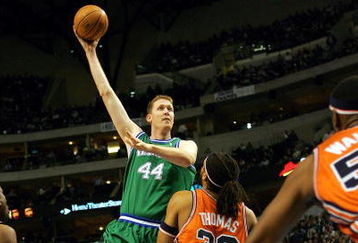 DALLAS - JANUARY 18:  Center Shawn Bradley #44 of the Dallas Mavericks takes a shot against Etan Thomas #36 of the Washington Wizards on January 18, 2005 at the American Airlines Center in Dallas, Texas. The Mavericks defeated the Wizards 137-120.  NOTE TO USER:User expressly acknowleges and agrees that, by downloading and/or using this Photograph, user is consenting to the terms and conditions of the Getty Images License Agreement.  (Photo by Ronald Martinez/Getty Images)