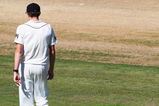 NAPIER, NEW ZEALAND - MARCH 30:  Iain O'Brien of New Zealand walks bakc to his fielding position following a drinks break after earlier dropping a catch during day five of the second test match between New Zealand and India at McLean Park on March 30, 2009 in Napier, New Zealand.  (Photo by Phil Walter/Getty Images)
