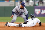 CHICAGO - OCTOBER 05:  DeWayne Wise #31 of the Chicago White Sox steals second base ahead of the tag by Jason Bartlett #8 of the Tampa Bay Rays in Game Three of the ALDS during the 2008 MLB Playoffs at U.S. Cellular Field on October 5, 2008 in Chicago, Illinois.  (Photo by Jamie Squire/Getty Images)