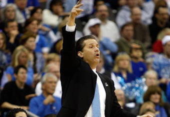 KANSAS CITY, MO - MARCH 21:  Head Coach John Calipari of the Memphis Tigers signals a play from the sideline during their second round game against the Maryland Terrapins in the NCAA Division I Men's Basketball Tournament at the Sprint Center on March 21, 2009 in Kansas City, Missouri. The Tigers defeated the Terrapins 89-70.  (Photo by Jamie Squire/Getty Images)