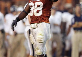 AUSTIN, TX - SEPTEMBER 20:  Brian Orakpo #98 of the Texas Longhorns celebrates a play during the game against the Rice Owls on September 20, 2008 at Darrell K Royal-Texas Memorial Stadium in Austin, Texas. Texas won 52-10. (Photo by Brian Bahr/Getty Images)