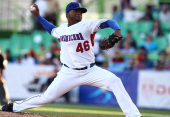 SAN JUAN, PUERTO RICO - MARCH 08:  Johnny Cueto #46 of the Dominican Republic pitches against  Panama during the 2009 World Baseball Classic Pool D match on March 8, 2009 at Hiram Bithorn Stadium in San Juan, Puerto Rico.  (Photo by Al Bello/Getty Images)