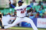 SAN JUAN, PUERTO RICO - MARCH 08:  Johnny Cueto #46 of the Dominican Republic pitches against  Panama during the 2009 World Baseball Classic Pool D match on March 8, 2009 at Hiram Bithorn Stadium in San Juan, Puerto Rico.  (Photo by Al Bello/Getty Images)