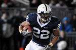 STATE COLLEGE - NOVEMBER 22:  Evan Royster #22 of the Penn State Nittany Lions runs the ball against the Michigan State Spartans on November 22, 2008 at Beaver Stadium in State College, Pennsylvania.  (Photo by Joe Sargent/Getty Images)