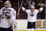 ANAHEIM, CA - MARCH 27: Sam Gagner #89 of the Edmonton Oilers raises his arms to teammate goaltender Dwayne Roloson #35 in celebration after they defeated the Anaheim Ducks 5-3 in their NHL game at Honda Center on March 27, 2009 in Anaheim, California. (Photo by Victor Decolongon/Getty Images)