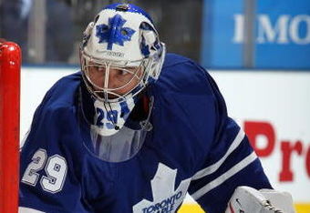 TORONTO - MARCH 14:  Martin Gerber #29 of the Toronto Maple Leafs defends the net against the Calgary Flames during the game at Air Canada Centre on March 14, 2009 in Toronto, Ontario, Canada. (Photo by Dave Sandford/Getty Images)