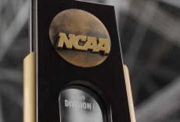 GLENDALE, AZ - MARCH 28:  The NCAA West Region Trophy is held by a member of the Connecticut Huskies after defeating the Missouri Tigers 82-75 in the Elite Eight of the NCAA Division I Men's Basketball Tournament at the University of Phoenix Stadium on March 28, 2009 in Glendale, Arizona.  (Photo by Ronald Martinez/Getty Images)