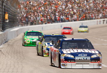 FORT WORTH, TX - APRIL 06: Dale Earnhardt Jr., driver of the #88 National Guard/AMP Energy Chevrolet, leads the field during the NASCAR Sprint Cup Series Samsung 500 at Texas Motor Speedway on April 6, 2008 in Fort Worth, Texas.  (Photo by Chris Graythen/Getty Images)