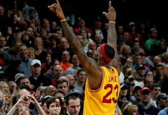 CLEVELAND - FEBRUARY 22:  LeBron James #23 of the Cleveland Cavaliers points to the crowd during the game against the Detroit Pistons on February 22, 2009 at the Quicken Loans Arena in Cleveland, Ohio.  The Cavaliers won 99-78.  NOTE TO USER: User expressly acknowledges and agrees that, by downloading and or using this photograph, User is consenting to the terms and conditions of the Getty Images License Agreement.  (Photo by Gregory Shamus/Getty Images)