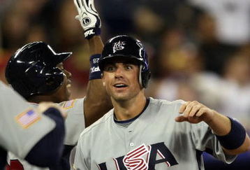 TORONTO, ON - MARCH 08:  David Wright #4 of the USA is congratulated after he scored a run in the sixth inning against Venezuela during the 2009 World Baseball Classic Pool C match on March 8, 2009 at the Rogers Centre in Toronto, Ontario, Canada.  (Photo by Elsa/Getty Images)