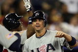 TORONTO, ON - MARCH 08:  David Wright #4 of the USA is congratulated after he scored a run in the sixth inning against Venezuela during the 2009 World Baseball Classic Pool C match on March 8, 2009 at the Rogers Centre in Toronto, Ontario, Canada.  (Photo by Elsa/Getty Images)