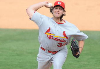 FORT LAUDERDALE, FL - FEBRUARY 26: Chris Perez #34 of the St. Louis Cardinals pitches against the Baltimore Orioles during a spring training game at Fort Lauderdale Stadium on February 26, 2009 in Fort Lauderdale, Florida. (Photo by Rob Tringali/Getty Images)