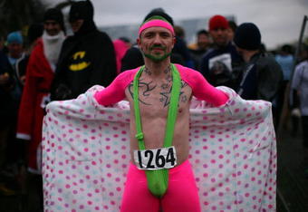 WOLVERHAMPTON, ENGLAND - FEBRUARY 01:  A competitor poses at the start of the Tough Guy Challenge 2009 at South Perton Farm on February 1, 2009 in Wolverhampton, England. The biannual event to raise cash for charity challenges thousands of international competitors to run through a gruelling set of 21 obstacles including water, fire and tunnels after a lengthy run at the start.  (Photo by Christopher Furlong/Getty Images)