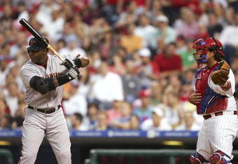 PHILADELPHIA - MAY 05:  Catcher Sal Fasano #13 of the Philadelphia Phillies signals an intentional walk for Barry Bonds #25 of the San Francisco Giants in the third inning at Citizens Bank Park on May 5, 2006 in Philadelphia, Pennsylvania.  (Photo by Jed Jacobsohn/Getty Images)