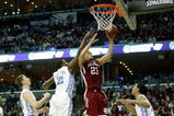 MEMPHIS, TN - MARCH 29:  Blake Griffin #23 of the Oklahoma Sooners goes up for a shot against Deon Thompson #21 and Danny Green #14 of the North Carolina Tar Heels during the NCAA Men's Basketball Tournament South Regional Final at the FedExForum on March 29, 2009 in Memphis, Tennessee. The Tar Heels defeated the Sooners 72-60 to advance to the Final Four.  (Photo by Joe Murphy/Getty Images)