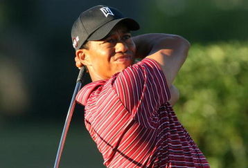 ORLANDO, FL - MARCH 29:  Tiger Woods of the USA watches his tee shot at the 16th hole during the final round of the Arnold Palmer Invitational Presented by Mastercard at the Bay Hill Club and Lodge on March 29, 2009 in Orlando, Florida  (Photo by David Cannon/Getty Images)
