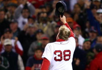 BOSTON - OCTOBER 25:  Curt Schilling #38 of the Boston Red Sox tips his hat to the crowd as he comes out of the game in the sixth inning against the Colorado Rockies during Game Two of the 2007 Major League Baseball World Series at Fenway Park on October 25, 2007 in Boston, Massachusetts.  (Photo by Elsa/Getty Images)