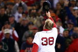 BOSTON - OCTOBER 25:  Curt Schilling #38 of the Boston Red Sox tips his hat to the crowd as he comes out of the game in the sixth inning against the Colorado Rockies during Game Two of the 2007 Major League Baseball World Series at Fenway Park on October 25, 2007 in Boston, Massachusetts.  (Photo by Elsa/Getty Images)