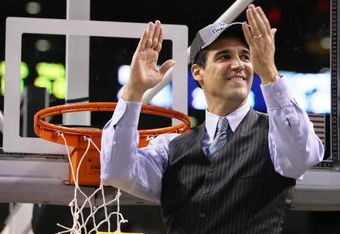 BOSTON - MARCH 28:  Head coach Jay Wright of the Villanova Wildcats cuts down the net after defeating the Pittsburgh Panthers during the NCAA Men's Basketball Tournament East Regionals at TD Banknorth Garden on March 28, 2009 in Boston, Massachusetts.  (Photo by Elsa/Getty Images)