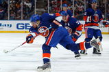 UNIONDALE, NY - MARCH 08:  Kyle Okposo #21 of the New York Islanders skates against the Phoenix Coyotes on March 8, 2009 at Nassau Coliseum in Uniondale, New York. The Isles defeated the Coyotes 3-2.  (Photo by Jim McIsaac/Getty Images)