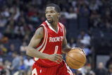 CHARLOTTE, NC - MARCH 13:  Aaron Brooks #0 of the Houston Rockets dribbles against the Charlotte Bobcats during their game at Time Warner Cable Arena on March 13, 2009 in Charlotte, North Carolina.  NOTE TO USER: User expressly acknowledges and agrees that, by downloading and/or using this Photograph, user is consenting to the terms and conditions of the Getty Images License Agreement. (Photo by: Streeter Lecka/Getty Images)