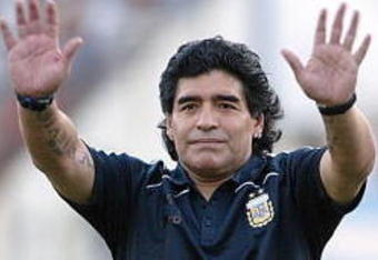 BUENOS AIRES, BUENOS AIRES - MARCH 28: Argentine manager Diego Maradona waves to the fans prior to the 2010 FIFA World Cup South African qualifier match between Argentina and Venezuela at River Plate Stadium on March 28, 2009 in Buenos Aires, Argentina.  (Photo by Photogamma/Getty Images)