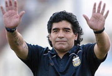 BUENOS AIRES, BUENOS AIRES - MARCH 28: Argentine manager Diego Maradona waves to the fans prior to the 2010 FIFA World Cup South African qualifier match between Argentina and Venezuela at River Plate Stadium on March 28, 2009 in Buenos Aires, Argentina.  (Photo by Photogamma/Getty Images)