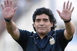 BUENOS AIRES, BUENOS AIRES - MARCH 28: Argentine manager Diego Maradona waves to the fans prior to the 2010 FIFA World Cup South African qualifier match between Argentina and Venezuela at River Plate Stadium on March 28, 2009 in Buenos Aires, Argentina.  (Photo by Photogamma/Getty Images)