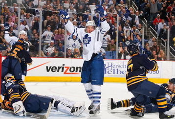 BUFFALO, NY - MARCH 27: Mikhail Grabovski #84 of the Toronto Maple Leafs celebrates Nikolai Kulemin's goal in the third period against the Buffalo Sabres on March 27, 2009 at HSBC Arena in Buffalo, New York.  (Photo by Rick Stewart/Getty Images)