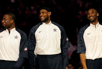 PHOENIX - FEBRUARY 15:  (L-R) Dwyane Wade, LeBron James and Kobe Bryant, members of the women's and men's gold medal winning USA Olympic basketball teams, wave to the crowd during half time of the 58th NBA All-Star Game, part of 2009 NBA All-Star Weekend at US Airways Center on February 15, 2009 in Phoenix, Arizona.  NOTE TO USER: User expressly acknowledges and agrees that, by downloading and or using this photograph, User is consenting to the terms and conditions of the Getty Images License Agreement.  (Photo by Ronald Martinez/Getty Images)