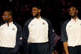 PHOENIX - FEBRUARY 15:  (L-R) Dwyane Wade, LeBron James and Kobe Bryant, members of the women's and men's gold medal winning USA Olympic basketball teams, wave to the crowd during half time of the 58th NBA All-Star Game, part of 2009 NBA All-Star Weekend at US Airways Center on February 15, 2009 in Phoenix, Arizona.  NOTE TO USER: User expressly acknowledges and agrees that, by downloading and or using this photograph, User is consenting to the terms and conditions of the Getty Images License Agreement.  (Photo by Ronald Martinez/Getty Images)