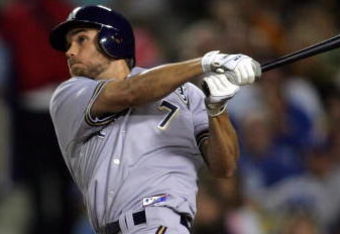 LOS ANGELES, CA - AUGUST 16:  J.J. Hardy #7 of the Milwaukee Brewers hits a two-run homerun in the eighth inning against the Los Angeles Dodgers during their MLB game at Dodger Stadium on August 16, 2008 in Los Angeles, California. The Brewers defeated the Dodgers 4-3. (Photo by Victor Decolongon/Getty Images)