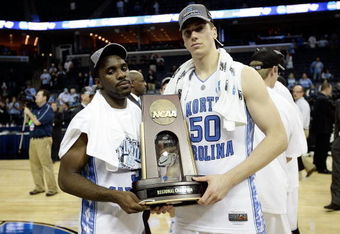 MEMPHIS, TN - MARCH 29:  (L-R) Ty Lawson #5 and Tyler Hansbrough #50 of the North Carolina Tar Heels pose with the South Regional trophy after defeating the Oklahoma Sooners during the NCAA Men's Basketball Tournament South Regional Final at the FedExForum on March 29, 2009 in Memphis, Tennessee. The Tar Heels defeated the Sooners 72-60 to advance to the Final Four.  (Photo by Joe Murphy/Getty Images)