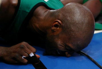 NEW YORK - FEBRUARY 06:  Kevin Garnett #5 of the Boston Celtics grimaces in pain after falling against the  the New York Knicks at Madison Square Garden February 6, 2009 in New York City. NOTE TO USER: User expressly acknowledges and agrees that, by downloading and/or using this Photograph, User is consenting to the terms and conditions of the Getty Images License Agreement.  (Photo by Chris McGrath/Getty Images)