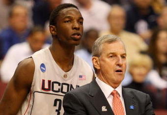 PHILADELPHIA - MARCH 21:  Hasheem Thabeet #34 of the Connecticut Huskies and head coach Jim Calhoun look on during the game against the Texas A&M Aggies during the second round of the NCAA Division I Men's Basketball Tournament at the Wachovia Center on March 21, 2009 in Philadelphia, Pennsylvania.  (Photo by Jim McIsaac/Getty Images)