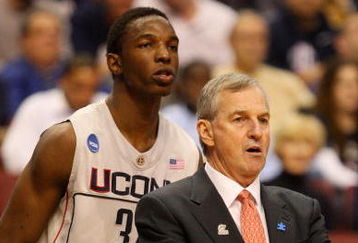 PHILADELPHIA - MARCH 21:  Hasheem Thabeet #34 of the Connecticut Huskies and head coach Jim Calhoun look on during the game against the Texas A&M Aggies during the second round of the NCAA Division I Men's Basketball Tournament at the Wachovia Center on March 21, 2009 in Philadelphia, Pennsylvania.  (Photo by Jim McIsaac/Getty Images)