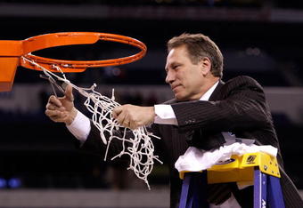INDIANAPOLIS - MARCH 29:  Head coach Tom Izzo of the Michigan State Spartans cuts down the final piece of the net following their 64-52 win against the Louisville Cardinals  during the fourth round of the NCAA Division I Men's Basketball Tournament at the Lucas Oil Stadium on March 29, 2009 in Indianapolis, Indiana.  (Photo by Andy Lyons/Getty Images)