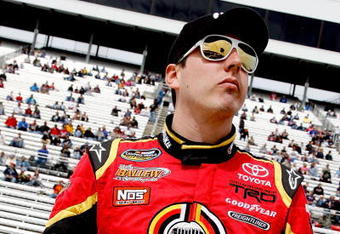 MARTINSVILLE, VA - MARCH 30:  Kyle Busch, driver of the #51 Miccosukee Resort Toyota, stands on the grid  before the NASCAR Camping World Truck Series Kroger 250 at the Martinsville Speedway on March 30, 2009 in Martinsville, Virginia.  (Photo by Rusty Jarrett/Getty Images for NASCAR)