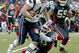 ORCHARD PARK, NY - DECEMBER 28: Heath Evans #44 of the New England Patriots runs after a catch for 12 yards as Ko Simpson #30 of the Buffalo Bills  makes the tackle at Ralph Wilson Stadium on December 28, 2008 in Orchard Park, New York. The Patriots won 13-0.  (Photo by Rick Stewart/Getty Images)