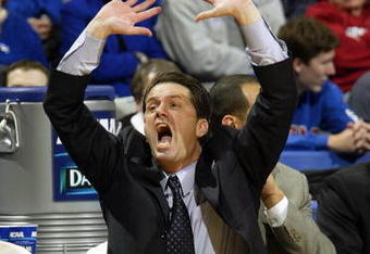 OKLAHOMA CITY - MARCH 20:  Head coach John Calipari of the Memphis Tigers reacts to a call during play against the Arizona State Sun Devils during the first round of the NCAA Tournament at the Ford  Center on March 20, 2003 in Oklahoma City, Oklahoma.  The Sun Devils defeated the Tigers 84-71.  (Photo by Ronald Martinez/Getty Images)