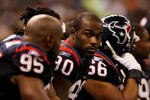 NEW ORLEANS - AUGUST 16:  Defensive end Mario Williams #90 of the Houston Texans rests on the bench while taking on the New Orleans Saints during a pre-season game at Louisiana Superdome on August 16, 2008 in New Orleans Louisiana.  (Photo by Doug Benc/Getty Images)
