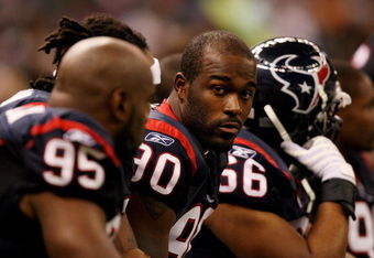 NEW ORLEANS - AUGUST 16:  Defensive end Mario Williams #90 of the Houston Texans rests on the bench while taking on the New Orleans Saints during a pre-season game at Louisiana Superdome on August 16, 2008 in New Orleans Louisiana.  (Photo by Doug Benc/Getty Images)