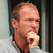 CARNOUSTIE, UNITED KINGDOM - JULY 19:  Former Newcastle United and England footballer Alan Shearer watches from a balcony during the first round of The 136th Open Championship at the Carnoustie Golf Club on July 19, 2007 in Carnoustie, Scotland.  (Photo by Andrew Redington/Getty Images)