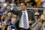 GLENDALE, AZ - MARCH 26:  Head Coach John Calipari of the Memphis Tigers adjusts his team against the Missouri Tigers in the Sweet 16 of the NCAA Division I Men's Basketball Tournament at the University of Phoenix Stadium on March 26, 2009 in Glendale, Arizona.  (Photo by Ronald Martinez/Getty Images)