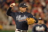 WASHINGTON - MARCH 30 :  Chipper Jones #10 of the Atlanta Braves fields a ground ball during a baseball game against the Washington Nationals on March 30, 2008 at Nationals Park in Washington D.C.  (Photo by Mitchell Layton/Getty Images)