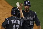 PHILADELPHIA - MAY 27: Ryan Spilborghs #19 of the Colorado Rockies gets congratulated by teammate Todd Helton #17 after hitting a two-run home run during the game against the Philadelphia Phillies at Citizens Bank Park May 27, 2008 in Philadelphia, Pennsylvania. (Photo by Drew Hallowell/Getty Images)