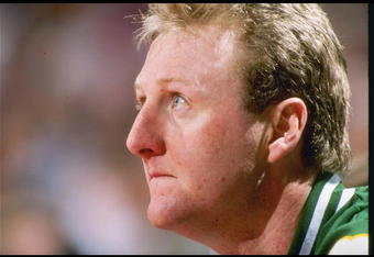 DENVER - 1990:  Boston Celtics forward Larry Bird #33 looks on from the bench during game against the Denver Nuggets at McNichols Arena in Denver, Colorado. (Photo by Allsport  /Allsport