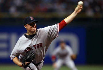 ST PETERSBURG, FL - OCTOBER 19:  Starting pitcher Jon Lester #31 of the Boston Red Sox delivers a pitch against the Tampa Bay Rays in game seven of the American League Championship Series during the 2008 MLB playoffs on October 19, 2008 at Tropicana Field in St Petersburg, Florida.  (Photo by Elsa/Getty Images)