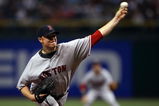 ST PETERSBURG, FL - OCTOBER 19:  Starting pitcher Jon Lester #31 of the Boston Red Sox delivers a pitch against the Tampa Bay Rays in game seven of the American League Championship Series during the 2008 MLB playoffs on October 19, 2008 at Tropicana Field in St Petersburg, Florida.  (Photo by Elsa/Getty Images)